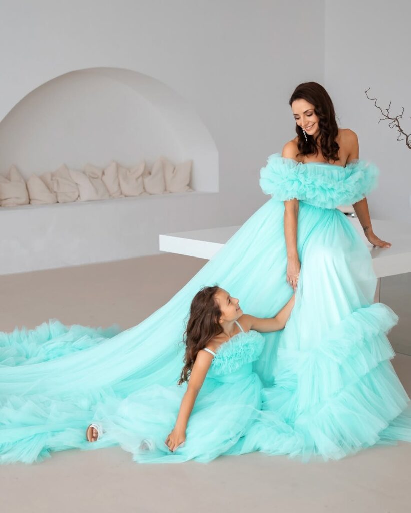 Mother-and-daughter photoshoot in matching mint dresses